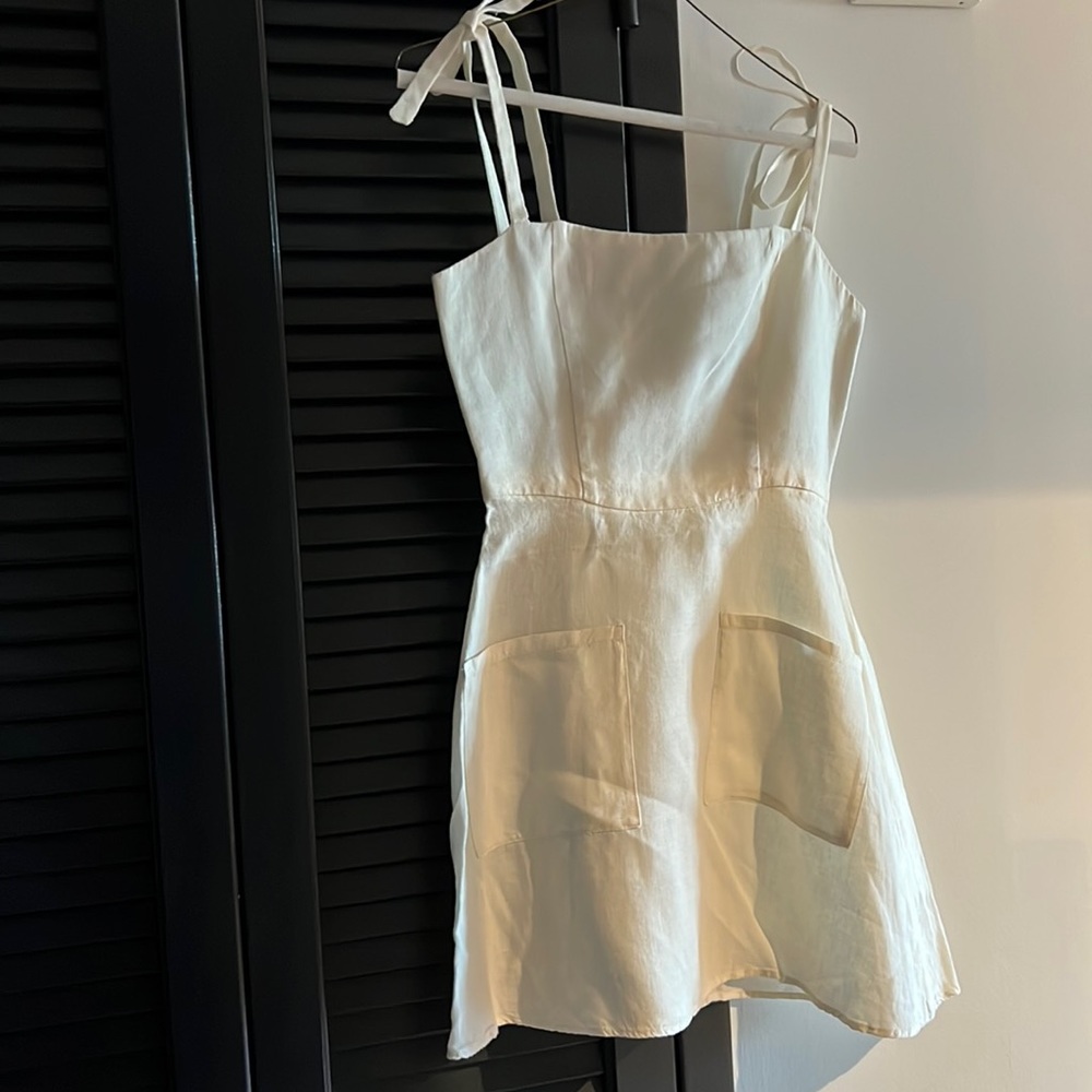 Adorable white summer dress! Great for summer outings or bridal events!